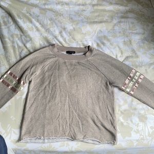 Long sleeved cream top